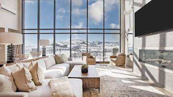 5 Bedroom Penthouse Suite with Mountain View | Living area | Flat-screen TV