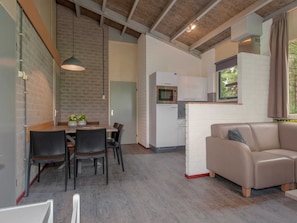 Bungalow | Living room | TV - Restyled Bungalow with Dishwasher near Nature Reserve (Weert)