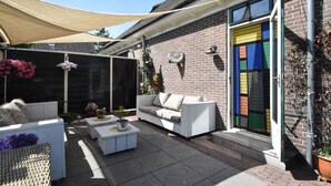 House | Balcony - Spacious Family House on Islet with Large Garden near Beach & Amsterdam (De Woude)