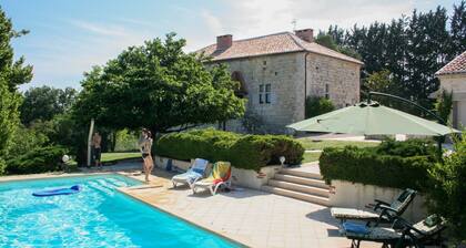 Pleasant House on a Domain With a Large Swimming Pool and a Park-like Garden