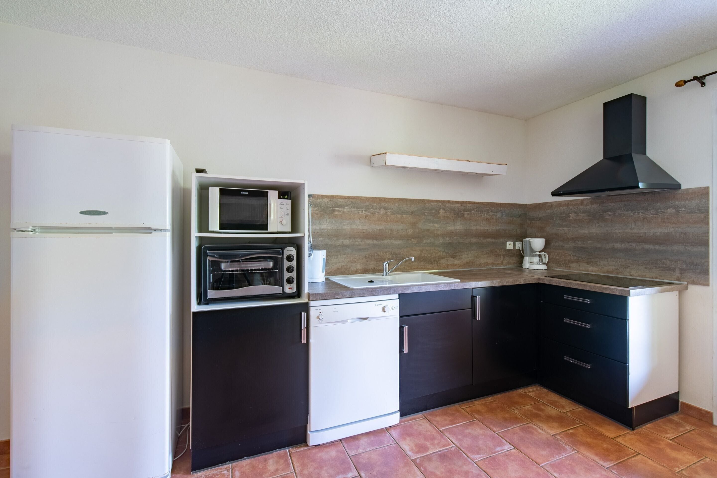 Villa | Private kitchen | Microwave, highchair