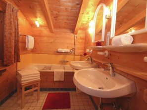 Chalet | Bathroom | Bathtub, towels - Cozy Chalet in Tyrol With Terrace (Sankt Johann in Tirol)