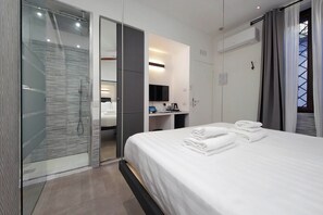 Habitació Deluxe | Matalassos d'escuma viscoelàstica, minibar i caixa forta a l'habitació 