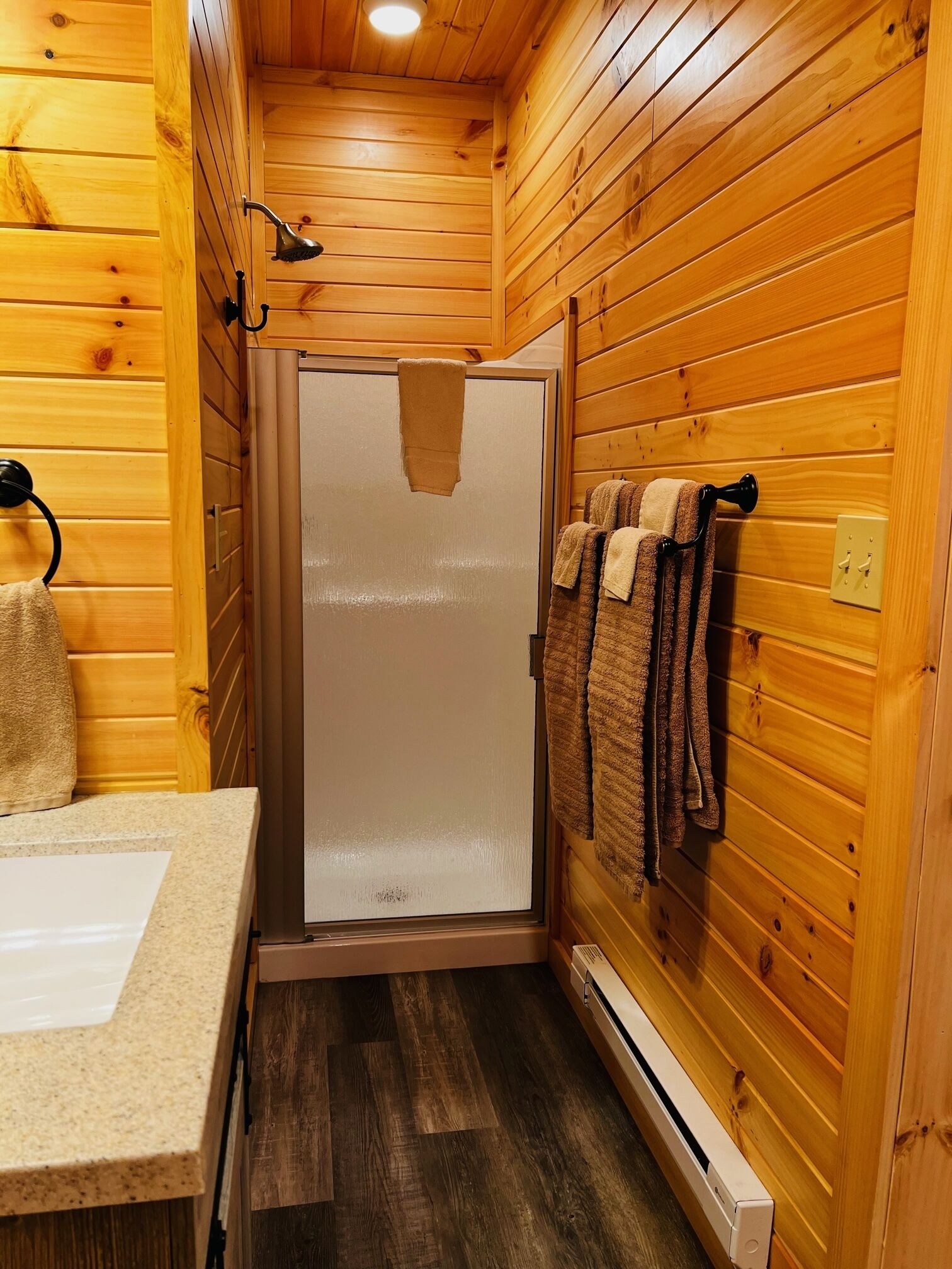 Shower, towels, soap, toilet paper