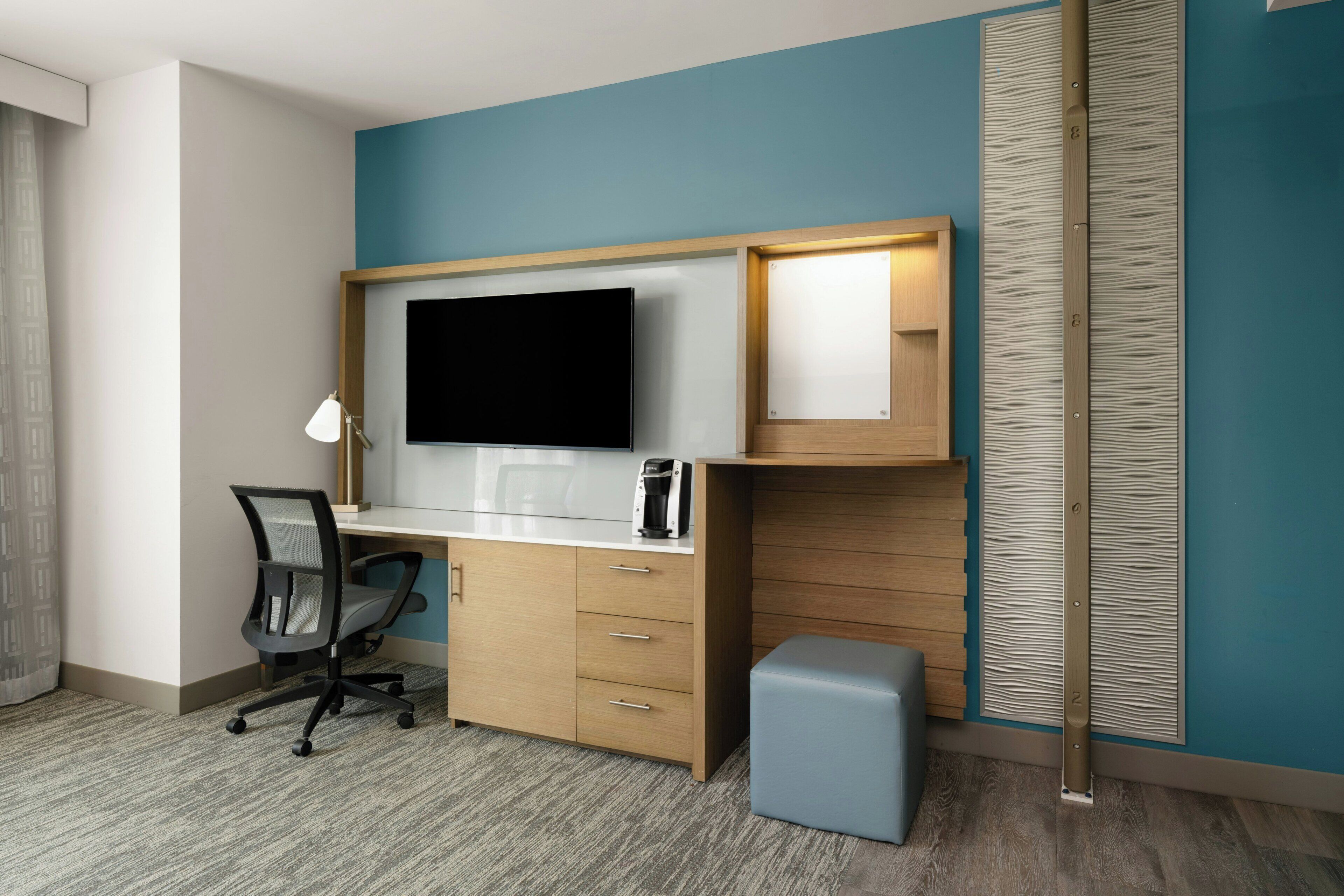 Premium bedding, down comforters, pillowtop beds, in-room safe