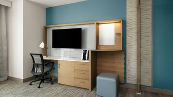 Premium bedding, down comforters, pillowtop beds, in-room safe