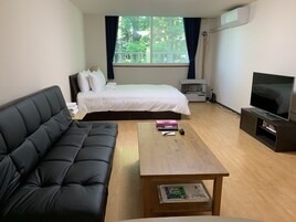Apartamento (Studio Bedroom) | Tabla de planchar con plancha, cunas (de pago), wifi gratis