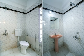 Standard Double Room | Bathroom | Shower, free toiletries, towels - OYO 49253 Raja Residency (Hyderabad)