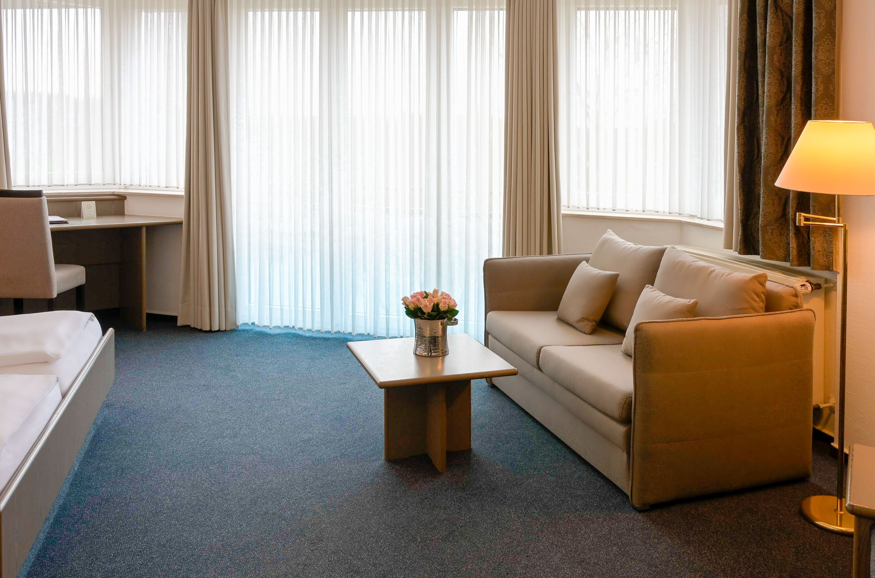 superior double room | living area | flat-screen tv