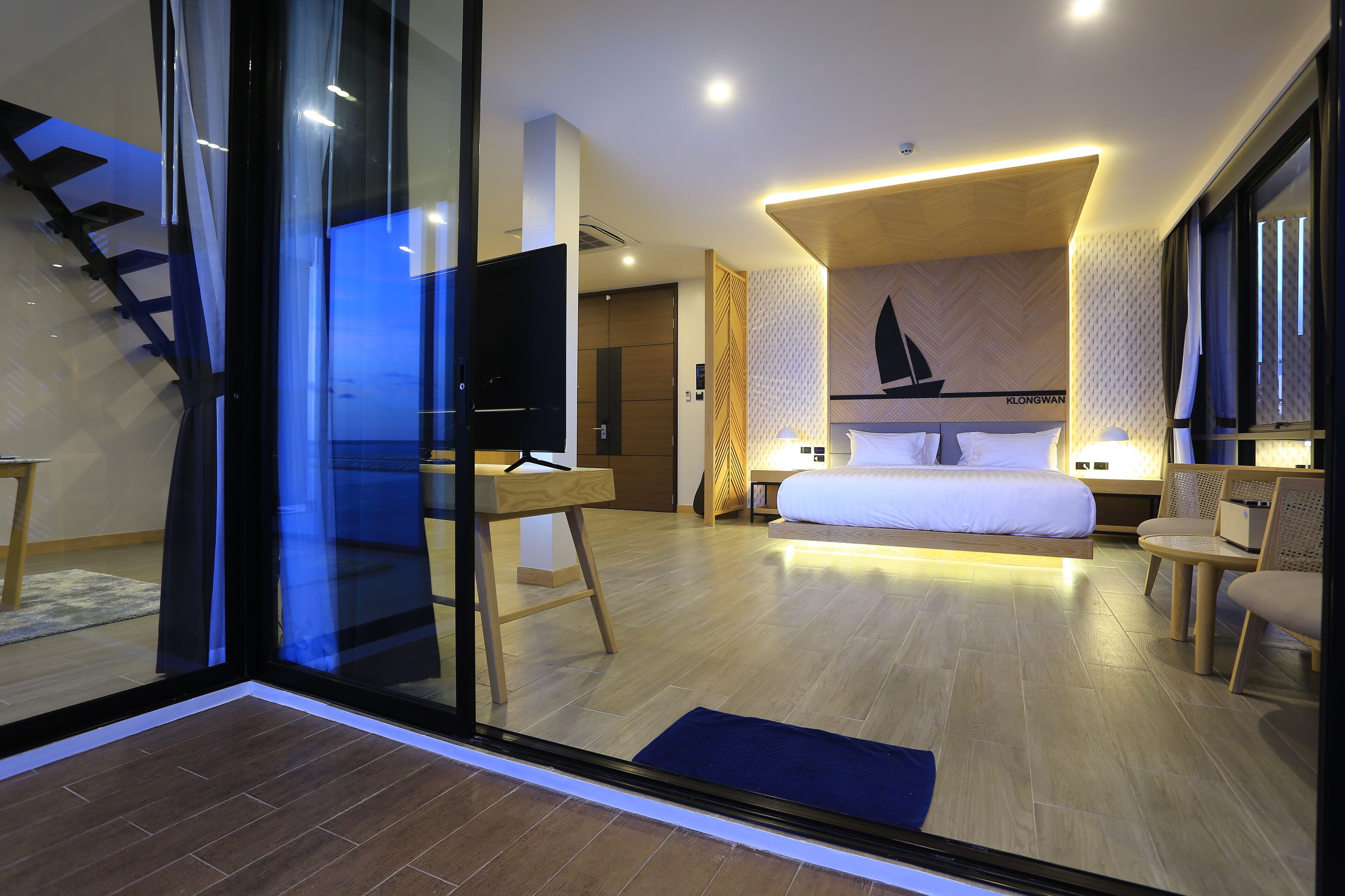 Light House Suite | Ylelliset vuodevaatteet, Select Comfort -patjalliset sängyt