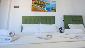 Habitación triple, balcón