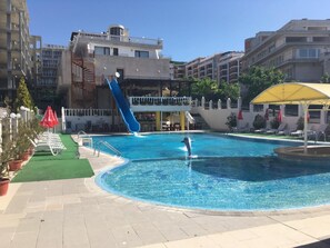 Seasonal outdoor pool, pool umbrellas, sun loungers