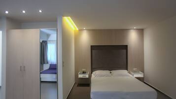 Estudio familiar, vistas al jardín | Caja fuerte, wifi gratis, ropa de cama