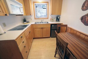 Microwave, stovetop, coffee/tea maker, toaster