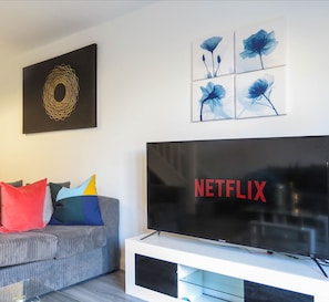 Maison mitoyenne Affaires | Salle de séjour | TV connectée