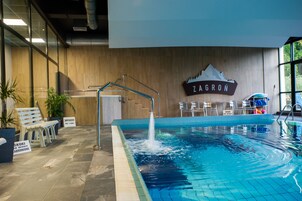 Indoor pool, free cabanas, lifeguards on site