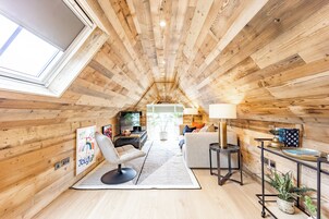 Superior 1-Bedroom Apartment (The Retreat) - (1 King) | Living area | Smart TV