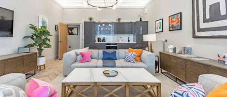 Deluxe 2-Bedroom Apartment - 2 bedrooms (1 King or 2 Singles) | Living area | Smart TV