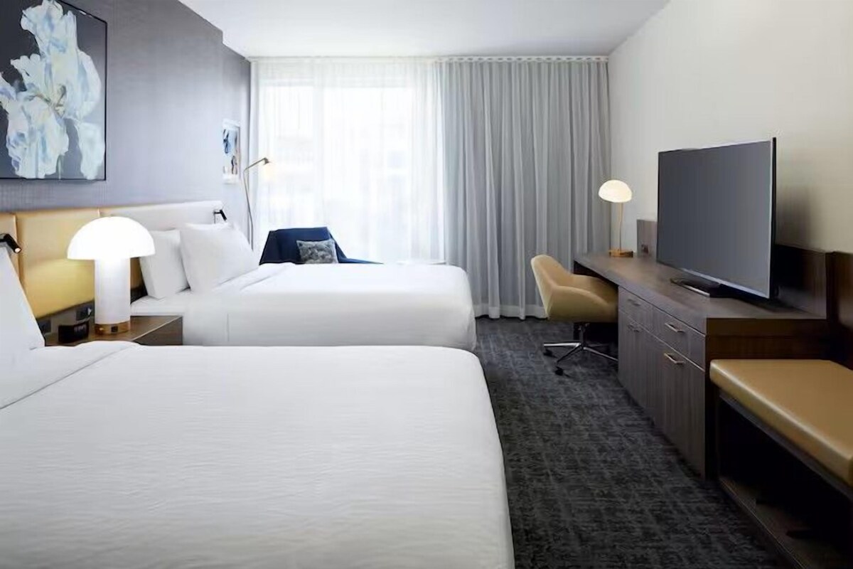 Hypo-allergenic bedding available, in-room safe, desk, laptop workspace