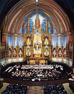A grand cathedral interior with a large choir and organ. - Hilton Garden Inn Montreal Midtown (Montreal)
