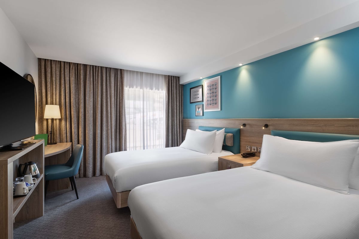Hypo-allergenic bedding, in-room safe, desk, laptop workspace