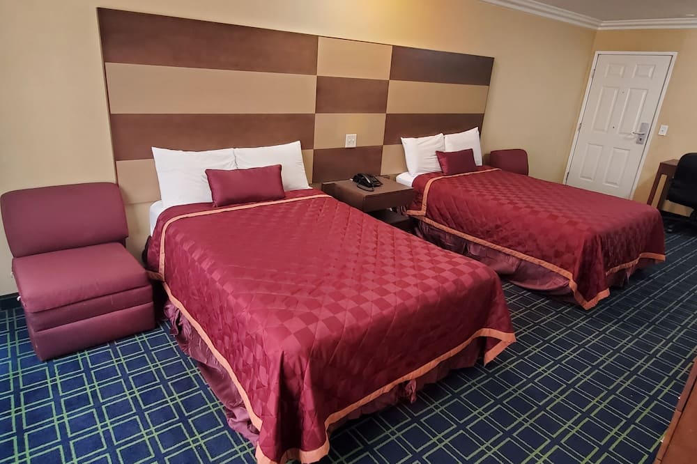 Delmonico Inn & Suites