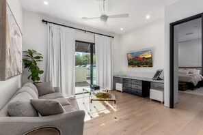 Smart TV, fireplace, table football, books