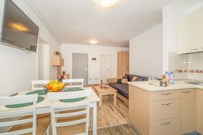 Family Apartment, Balcony | Private kitchen