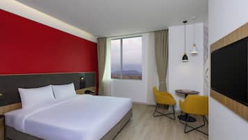 Superior Room, 1 King Bed, Mountain View | Minibar, in-room safe, iron/ironing board, free cribs/infant beds