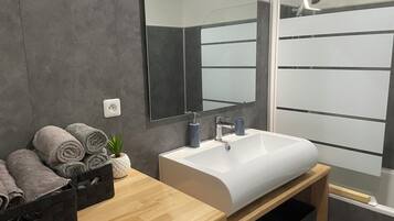 Hair dryer, towels, soap, toilet paper