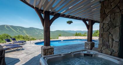 Stunning views, luxurious home, heated pool, hot tub, games