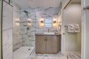 Shower, hair dryer, towels