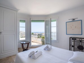 2 dormitorios, tabla de planchar con plancha, Internet y ropa de cama