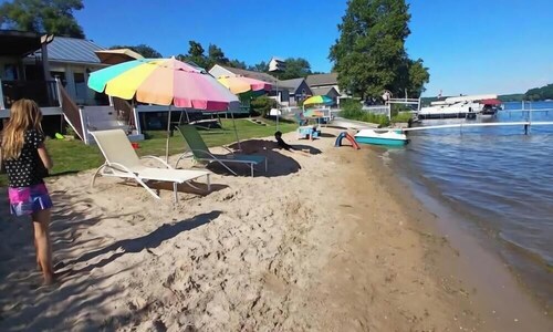 Very Clean Lakefront Home with Sandy Beach and Clear water.