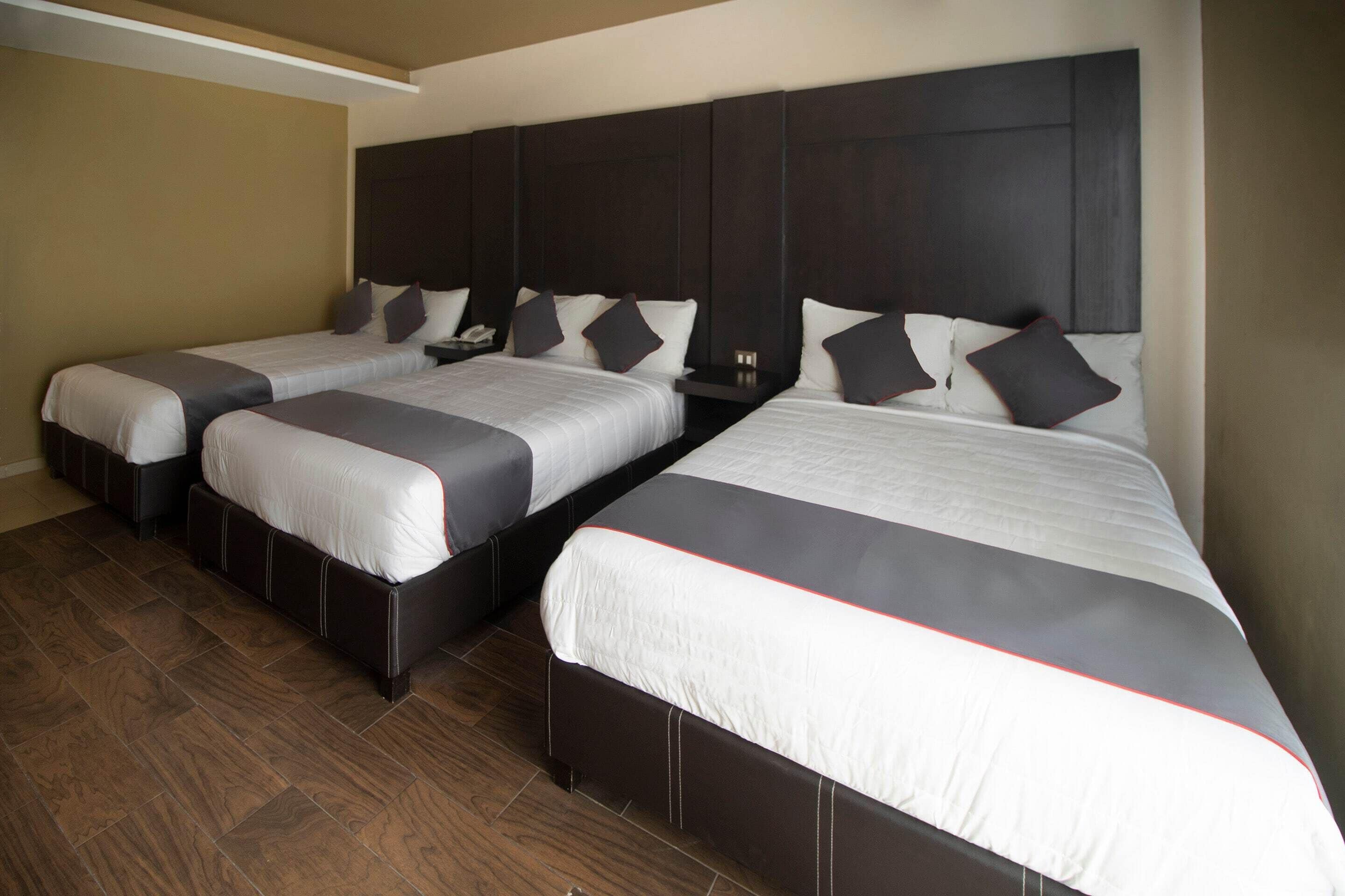 standard room (three beds) | 1 bedroom, desk, iron/ironing board, free wifi