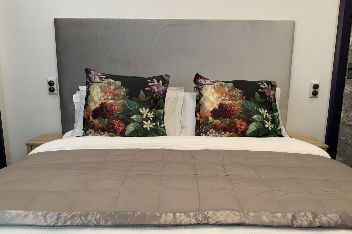 Premium bedding, down duvets, desk, laptop workspace