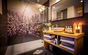 Bathtub, hair dryer, towels, soap