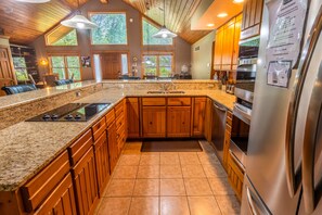 Fridge, microwave, oven, stovetop - Cozy Cabin Getaway – Trails, Fireplaces & Outdoor Fun near Lake Michigan (Michigan City)