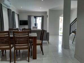 Superior Apartment | Living area | 29-inch LED TV with satellite channels, TV