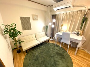 Traditional Apartment | Living area | 32-inch flat-screen TV with digital channels, TV - Yoyogi Apartment 2-401 (Tokyo)