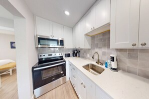 Fridge, microwave, dishwasher, coffee/tea maker