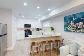 Fridge, microwave, dishwasher, coffee/tea maker