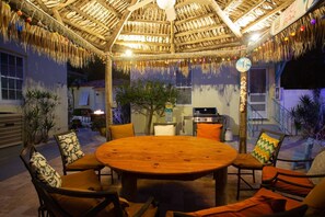 Outdoor dining - A Private, Spacious and Updated Home Away From Home. Heated Pool. Paddleboards & Beach Gear! (Madeira Beach)