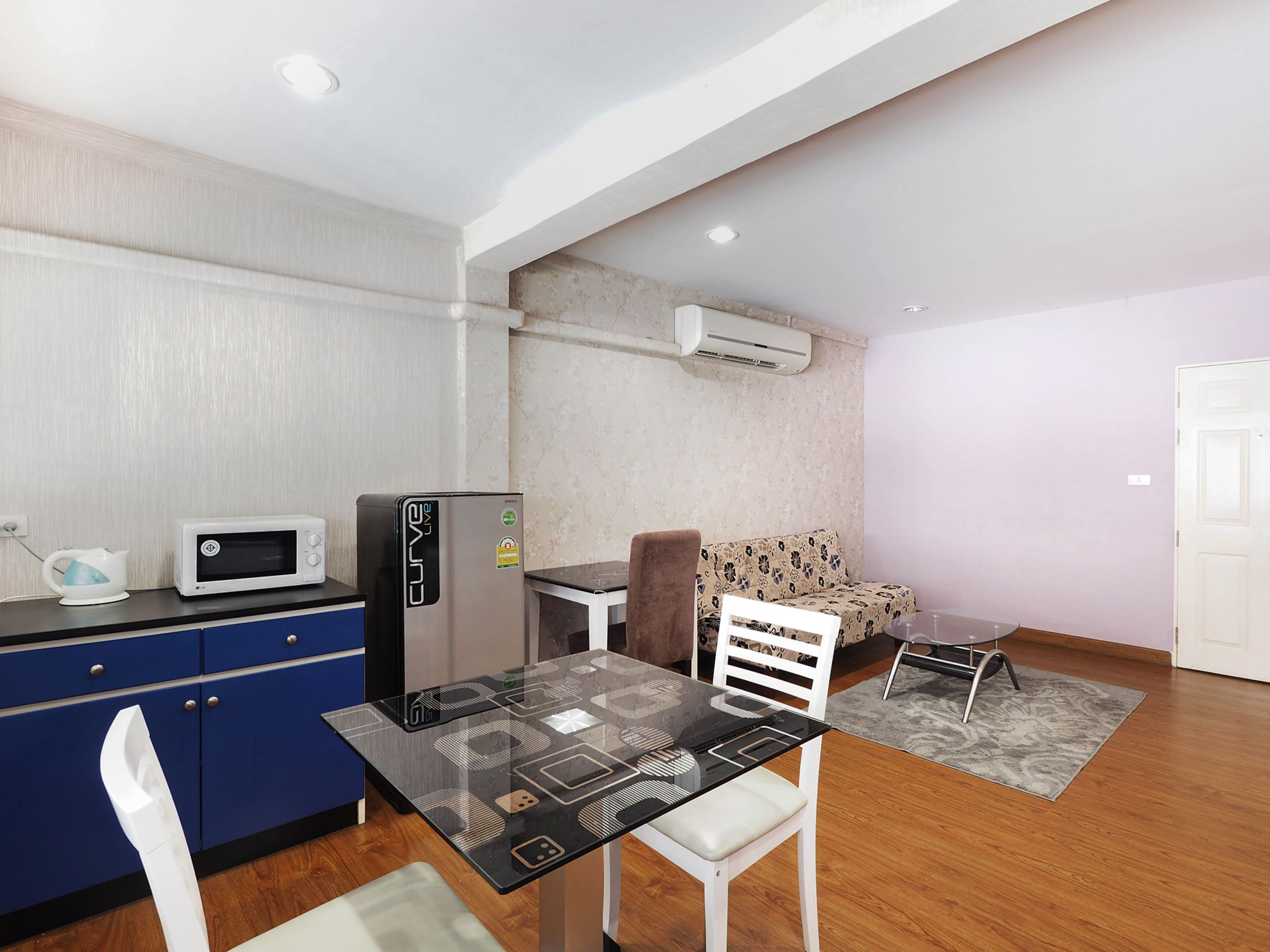 Foto - OYO 995 Blue Cafe Apartment