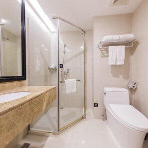 Shower, free toiletries, hair dryer, slippers