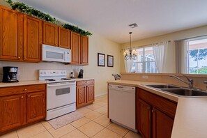 Fridge, dishwasher, coffee/tea maker