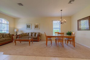 Living area - The Shores- Discounted Pricing 
(1/1-2/28/26); 4BR/3BA Southwest exposure pool home w/lake views! (Naples)