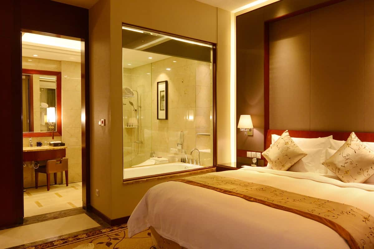 City Double Room | Minibar, in-room safe, blackout drapes, iron/ironing board