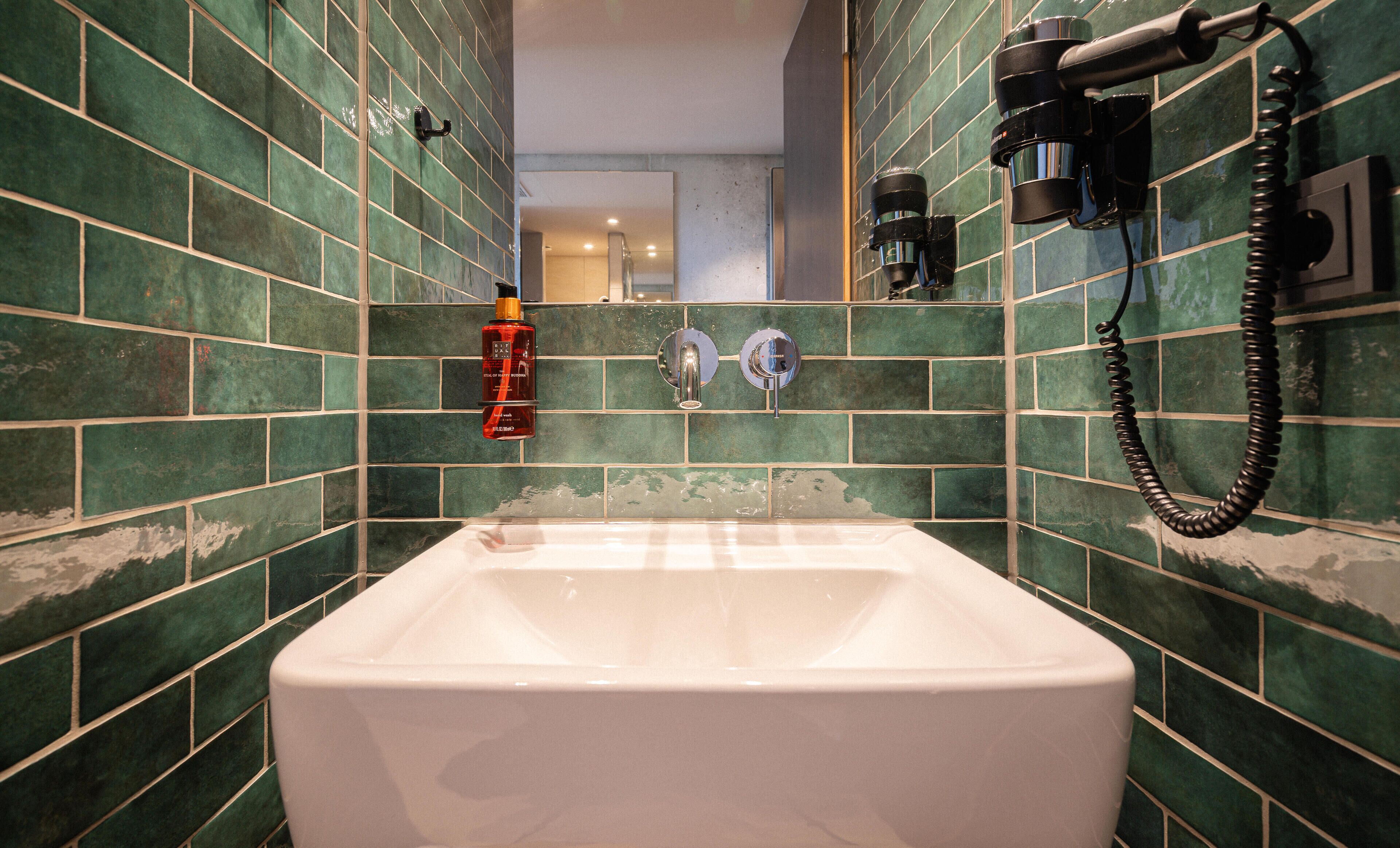 hair dryer, towels, soap, shampoo