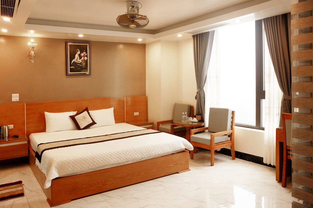 Deluxe Double Room, Beach View | Minibar, desk, free WiFi